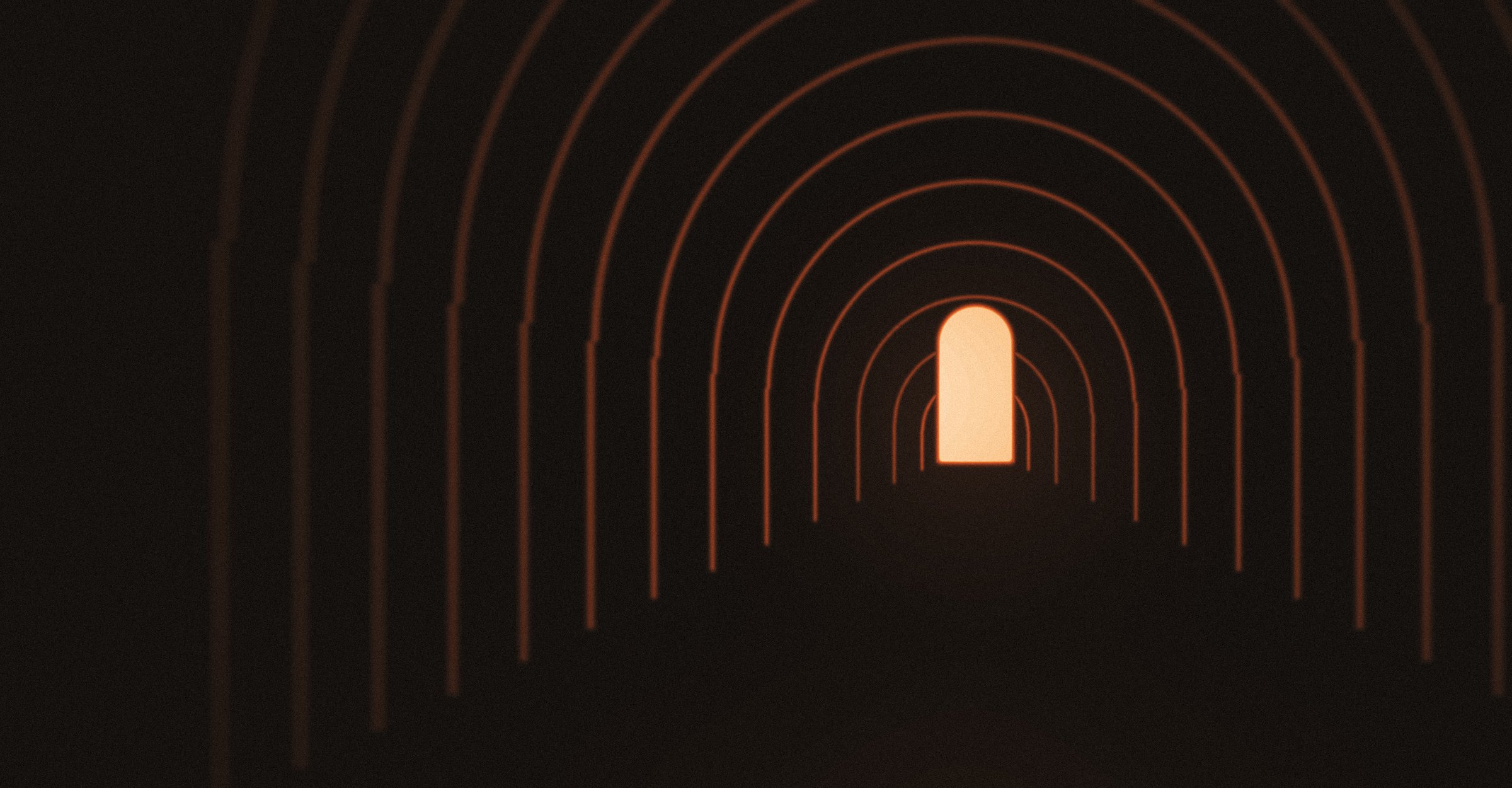 Looking down a kiln chamber, arch courses receding toward the fire